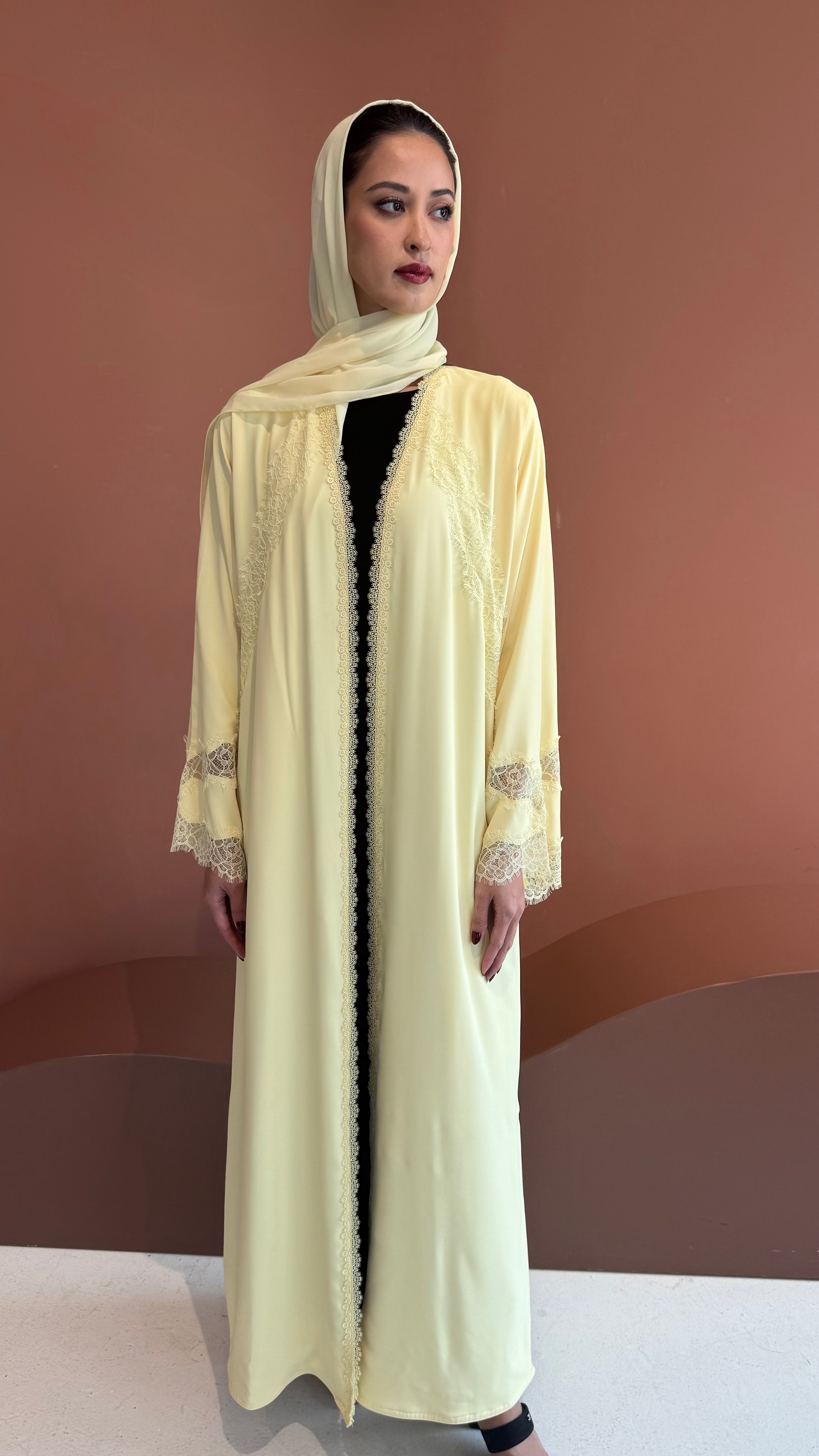Butter yellow lace abaya.