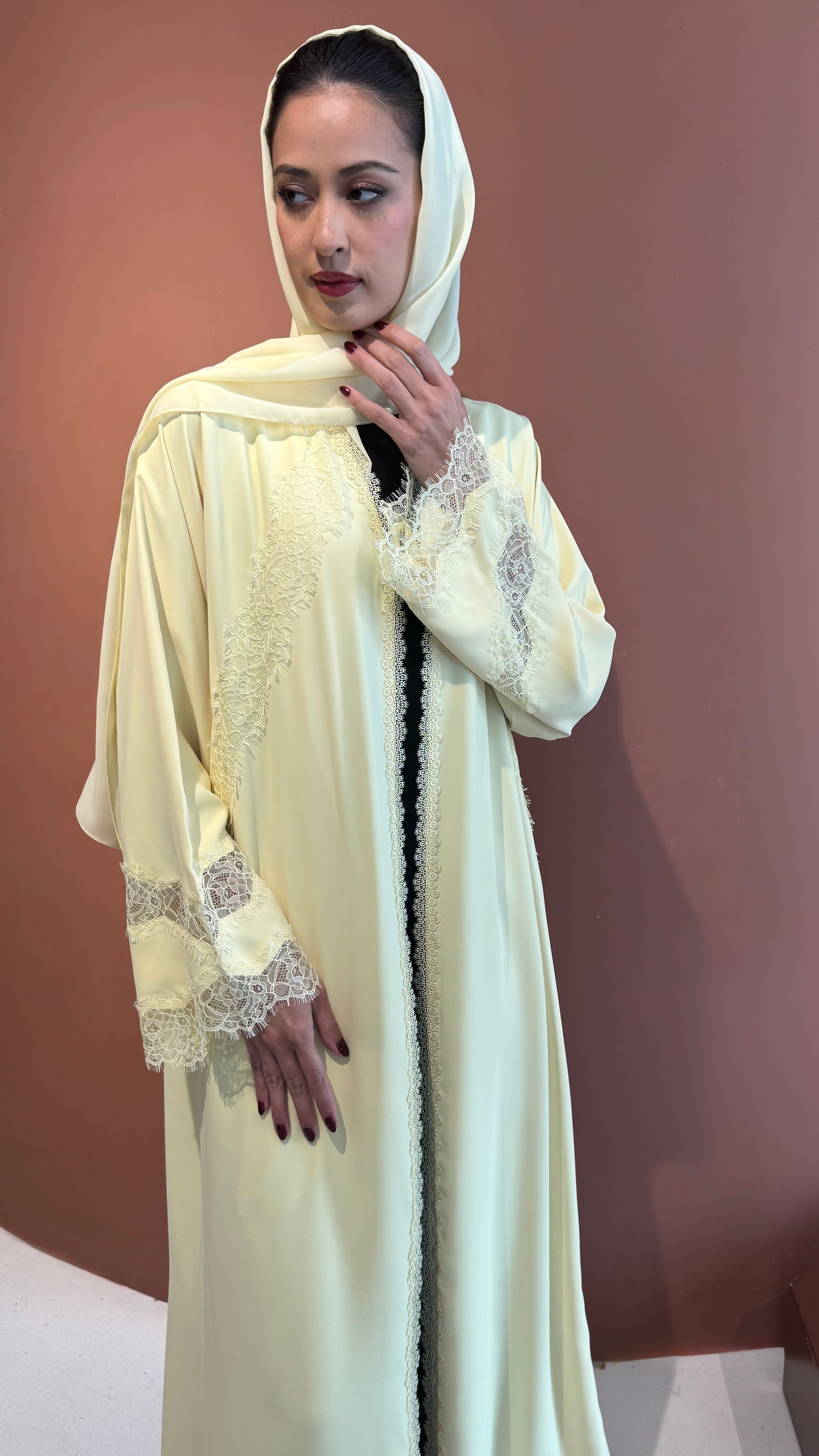 Butter yellow lace abaya.