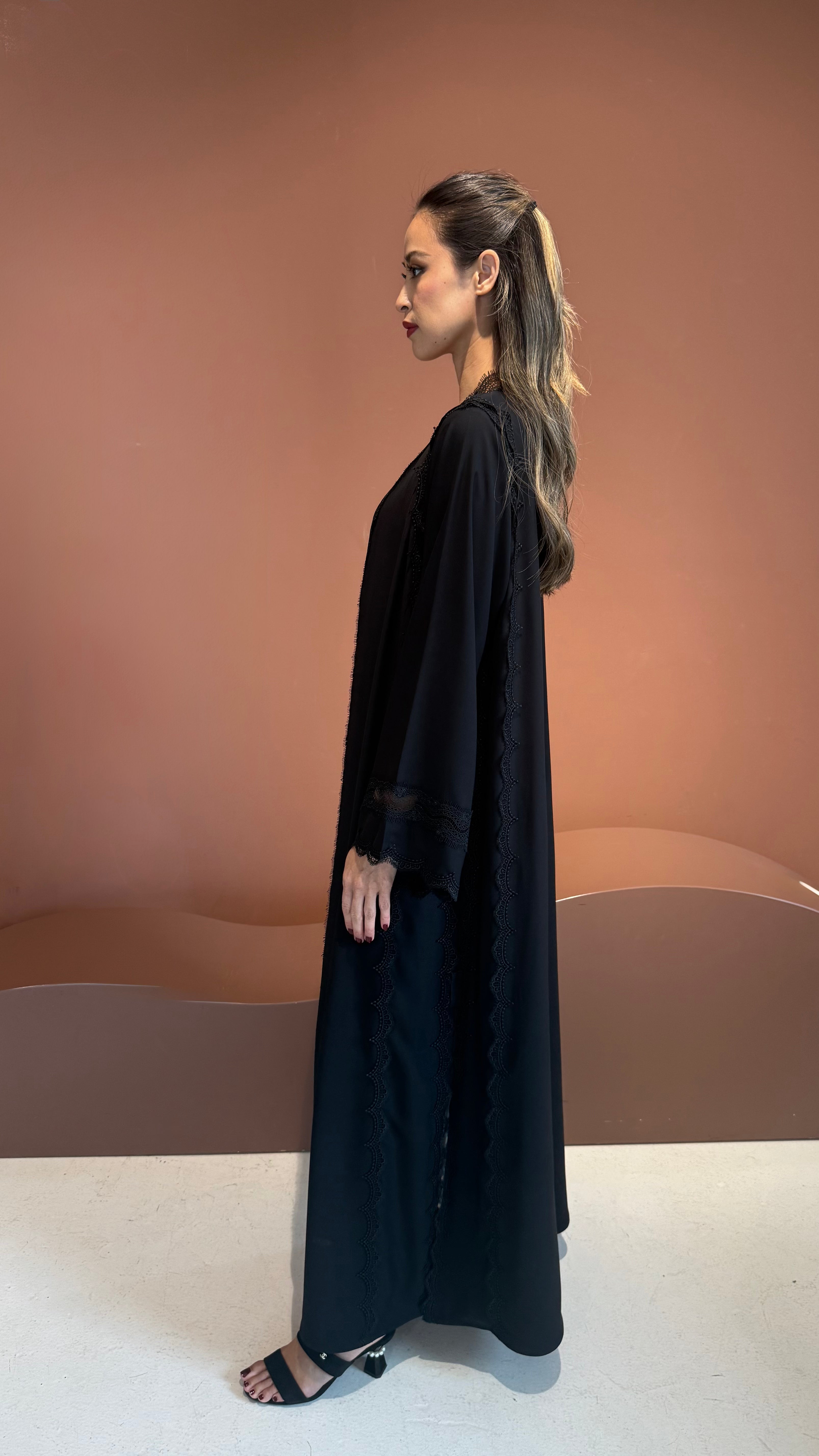 Noir lace abaya.